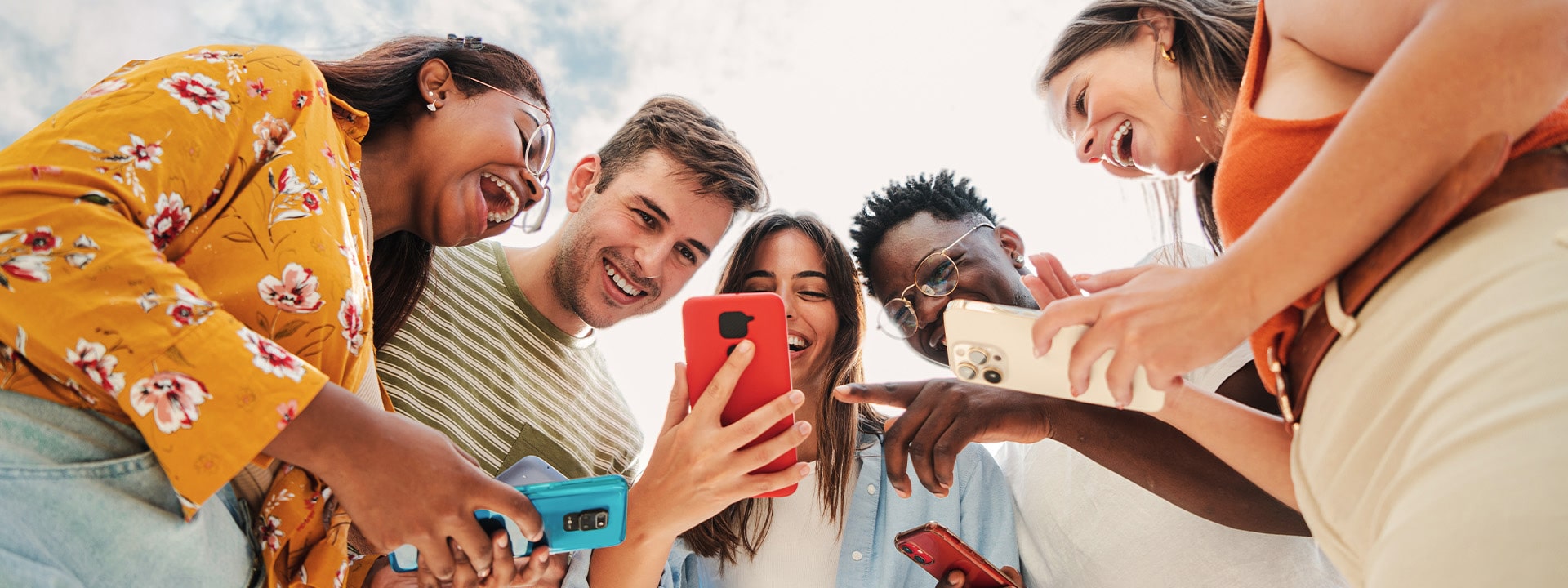 group of people looking at mobiles